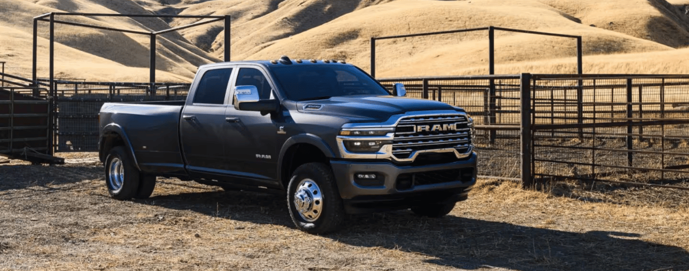 Grey 2026 Ram 3500 parked at an angle on a ranch